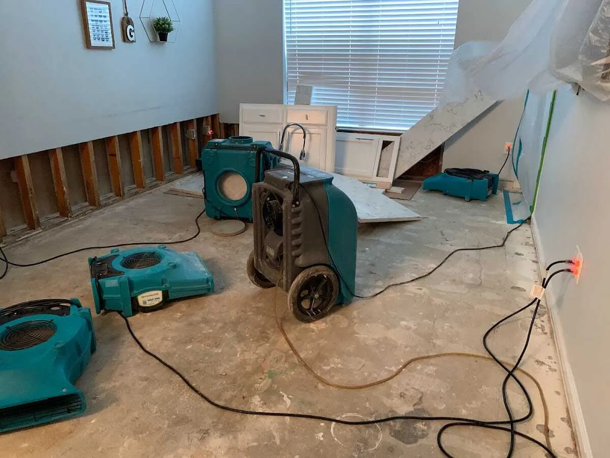 Dehumidifier in flood-cut room for Water Damage Restoration in Kingsland